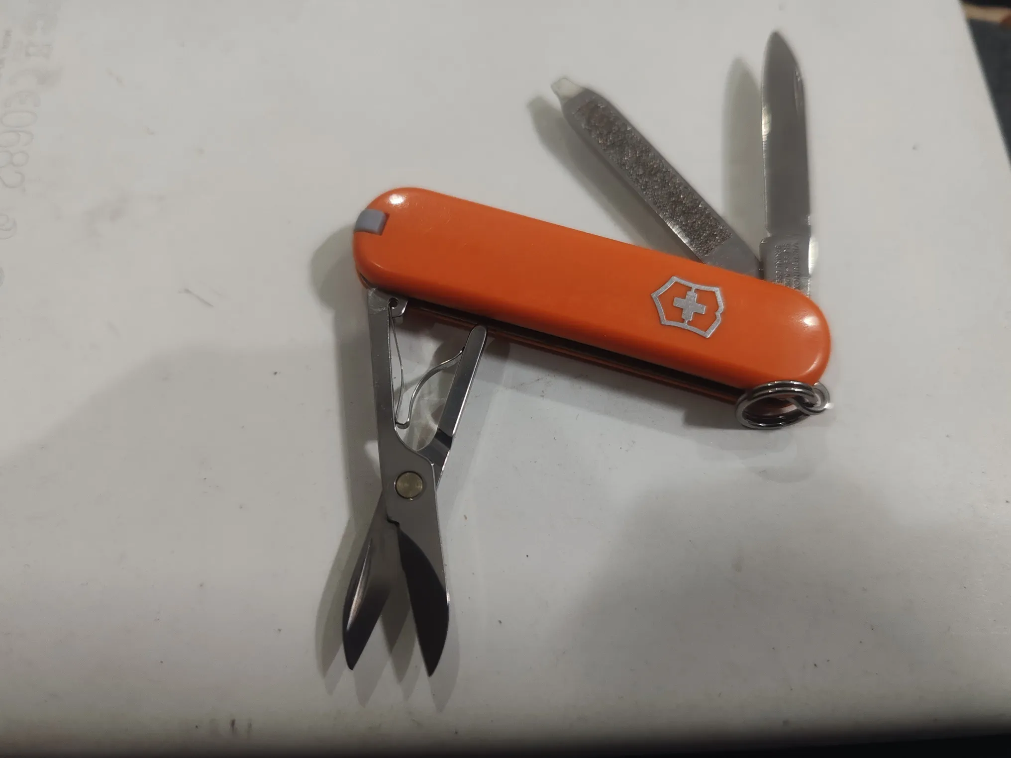 Buy used Victorinox Classic SD Multi-tool Orange Silver Swiss Made online on Resellpur