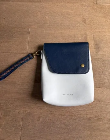 Buy used Raven + Lily Very Good Condition Women's Wristlet Pouch Grey Navy Detachable Strap online on Resellpur