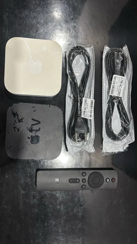 Sold second hand Apple TV Used Black Streaming Device With Remote And Cables on Resellpur