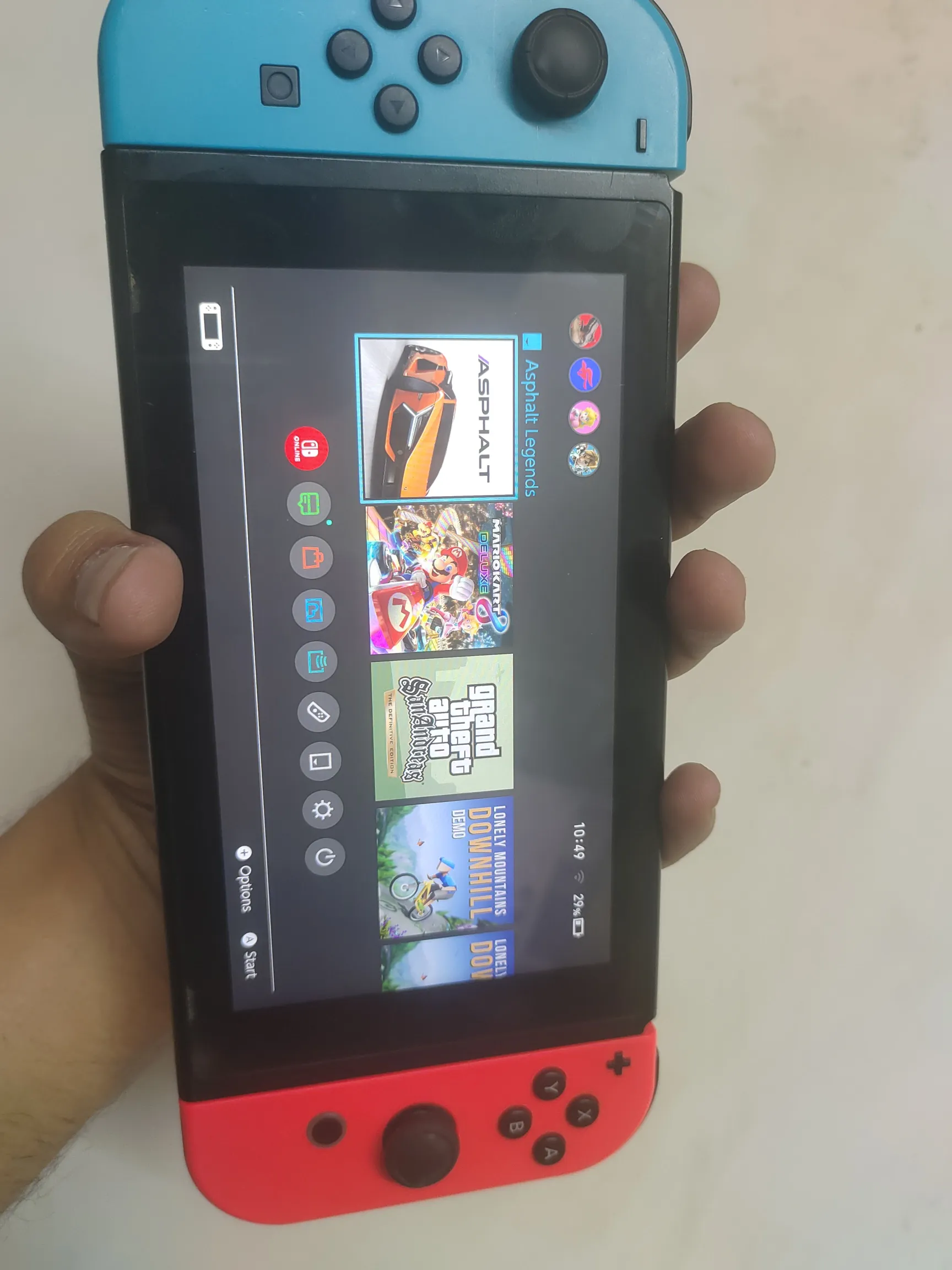Sold second hand Nintendo Switch V2 Working Condition Red/blue on Resellpur