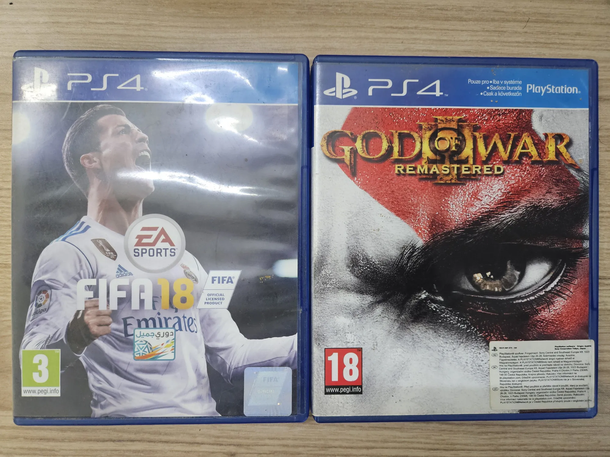 Buy used Playstation 4 God Of War 3 Remastered & FIFA 18 - Used - Video Games online on Resellpur