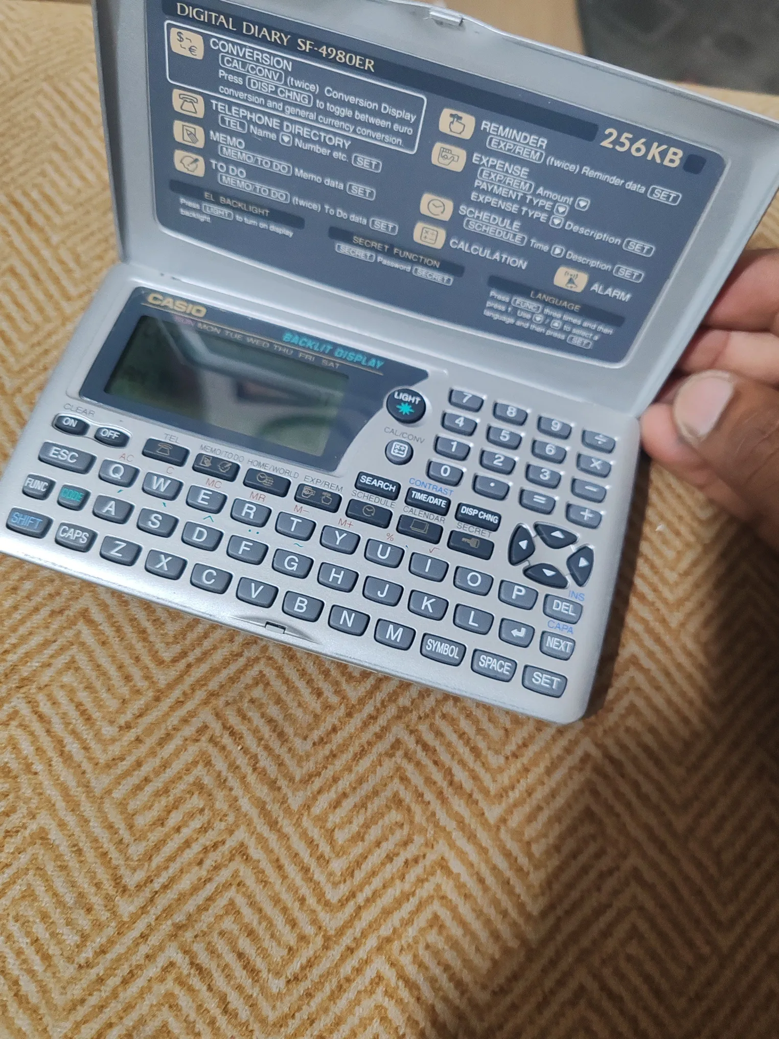Buy used Casio SF-4980ER Digital Diary 256KB Vintage Silver Personal Organizer online on Resellpur
