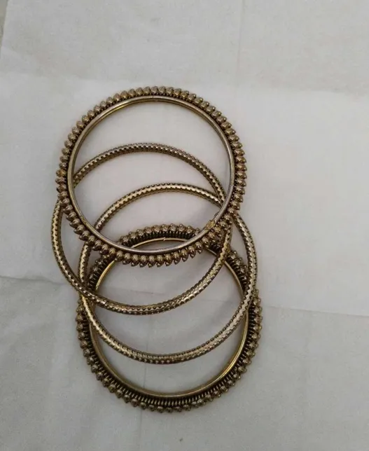 Buy used Golden Bangles | New | Women | Bangles | Gold | | Lightweight Design online on Resellpur