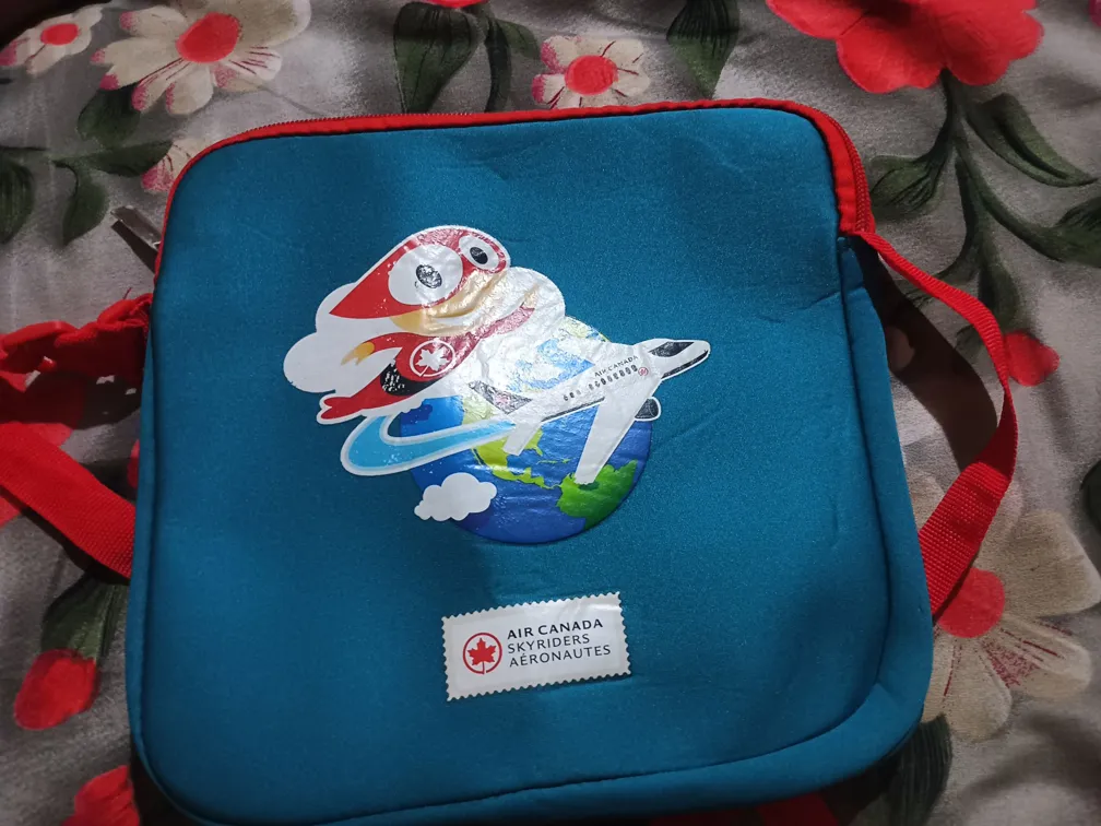 Air Canada Skyriders Kids Travel Sling Bag Blue With Red Straps Adjustable