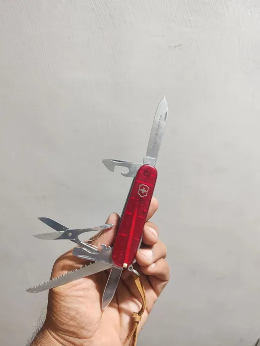 Buy used Victorinox Huntsman Excellent Pre-owned Swiss Army Knife Ruby Translucent 91mm Collectible online on Resellpur