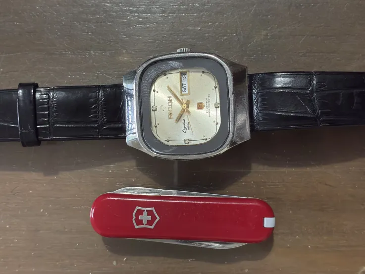 Buy used Ricoh Japanese Automatic Watch With Victorinox Swiss Army Knife online on Resellpur