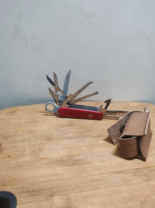 Sold second hand Victorinox Swiss Champ Multi-tool Red With Handmade Leather Case on Resellpur