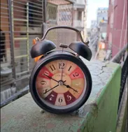 Buy used Vintage Twin Bell Alarm Clock | Pre-owned | Classic Retro Design | Black | Compact & Loud Alarm online on Resellpur