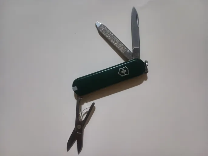 Buy used Victorinox Classic SD Swiss Knife – Green – Multi-purpose Tool online on Resellpur